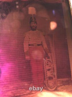 1/4 tinted ambrotype civil war soldier musician holding OTS saxhorn