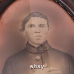 Antique Convex Glass Oval Tiger Frame Photo. Resembles a Civil War Soldier