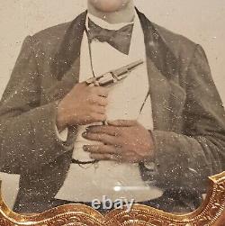 Armed Civil War period civilian with life-like coloration to skin ambrotype