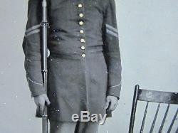 Armed Civil War sergeant tintype photograph & case
