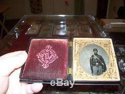 Armed civil war soldier tintype image in a case