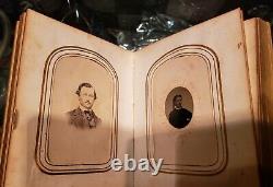 CDV album with tintype photographs 33 images in total needs fixing on the binding