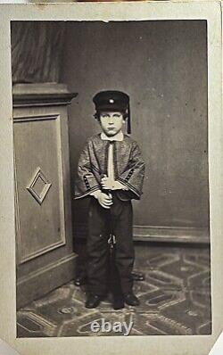 CDV of Serious Young Boy in Uniform &Cap, Standing at Attention, Holding Rifle