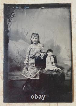 CIVIL WAR ERA GIRL with SEATED LARGE PORCELAIN CHINA DOLL TINTYPE PHOTO