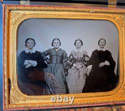 Civil War-era 1/2 plate tinted clearglass ambrotype in rare case of four women