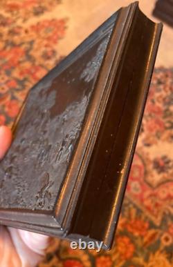 Civil War-era 1/2 plate tinted clearglass ambrotype in rare case of four women