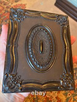 Civil War-era 1/2 plate tinted clearglass ambrotype in rare case of four women