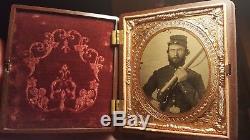 Civil War tintype of grizzly armed soldier cracking, but stable condition