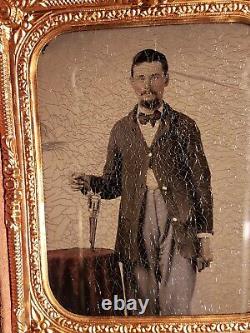 Civil War tintype of soldier with great shot of Remington revolver tinted table