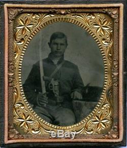 Civil war tintype of Union cavalry soldier double armed with starr double action