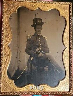 Half plate ambrotype of civil war US regular army officer armed with sword