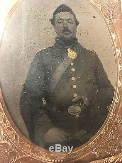 Original Civil War Union Soldier Tintype with Pistol, Buckle, and Badge in photo