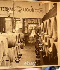 Post Civil War cabinet card of a liquor store, lots of barrels, sharp image