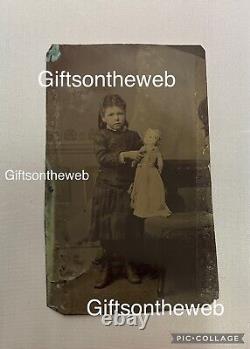 Rare Antique Civil War Era Tintype Of Little Girl with Toy China Doll